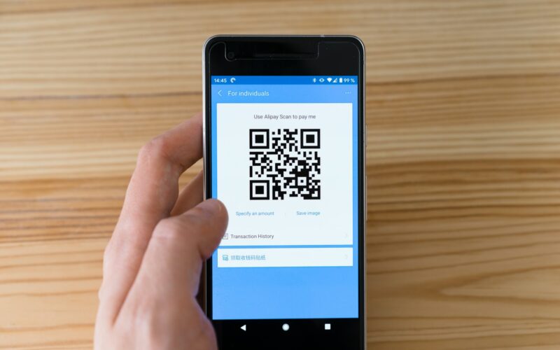 black android smartphone displaying qr code